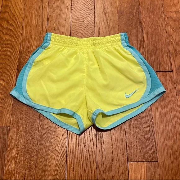Nike running shorts yellow online